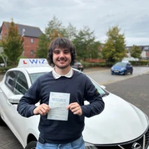 Manchester driving instructor celebrates student pass with Wiz Driving School